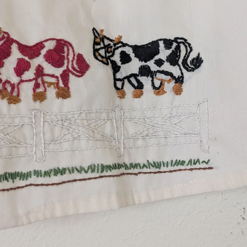 Vintage Hand Embroidered Child's Apron, Cream with Black and Red Cows